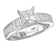 a princess cut diamond engagement ring with channeled shoulders