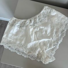 Vintage Christian Dior Silk & Lace Lingerie Panty Shorts. New With Tags (But Small Flaw- Pictured - But Not Noticeable When Worn.) This Is Such A Unique And Well Made Item - Feel Like A Queen Lounging At Home! Labelled A 6 But Fits Like An Xxs & The Waist Band Has A Lot Of Stretch. White Short Sets For Daywear, Feminine Summer Bottoms With Delicate Lace, Feminine Delicate Lace Bottoms For Summer, Elegant Fitted Shorts For Loungewear, Delicate Lace Summer Bottoms For Daywear, Elegant Short Bottoms With Delicate Lace, Lace Wedding Bottoms For Summer, Feminine Lace Trim Bottoms For Wedding, Feminine Wedding Bottoms With Lace Trim