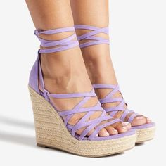 Brand New! Sheer Lilac A Platform Wedge Sandal With Tie Closure. Material: Faux-Leather Features: Sd Dream Sole - Double The Padding For Comfort, Support, And Ease Of Movement Platform Height: 1.5" Outside Heel Height: 5" Closure: Ankle Ties Purple Wedge Heel Sandals In Synthetic Material, Summer Synthetic Wedge Sandals With Wrapped Heel, Summer Wedge Sandals With Wrapped Heel, Purple Open Toe Synthetic Wedge Sandals, Purple Platform Sandals For Beach, Purple Platform Sandals For The Beach, Purple Synthetic Wedge Heel Sandals, Spring Synthetic Wedge Sandals With Wrapped Heel, Casual Purple Wedge Sandals For Summer