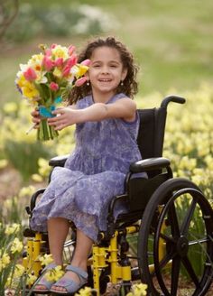 [COURAGE] The girl in the photograph is seated in a wheelchair, just as how Kira is crippled in the novel. However, how the girl smiles and holds out flowers is representative of how Kira is courageous and finds her inner strength despite the many difficulties she faces. Quote: "She gripped her wooden cane tightly and tried to stare back with no hint of fear." Jesus Loves The Little Children, Wheel Chair, We Are The World, Special Needs Kids, People Of The World, Jesus Loves, Wheelchair, Little People, Baby Pictures