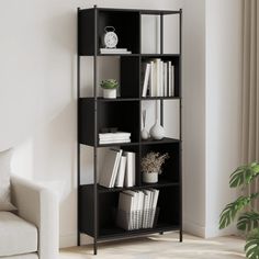 a black book shelf with books and plants