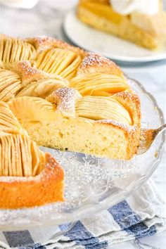 a close up of a pie on a plate with one slice cut out and ready to be eaten