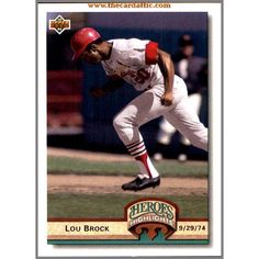 a baseball card with a player in the middle of running to first base on it