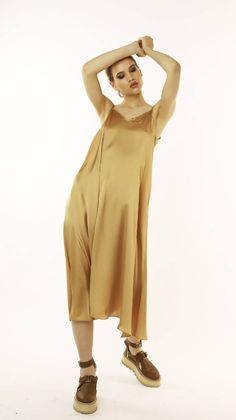 Midi Casual Dress in Mustard Sleeveless Silk V-neck Dress For Summer, Silk V-neck Summer Dress, Sleeveless Satin V-neck Dress For Summer, Gold V-neck Slip Dress For Spring, Chic Gold Silk Midi Dress, Spring Silk Knee-length Slip Dress, Silk V-neck Bias Cut Slip Dress, Sleeveless Silk V-neck Dress For Spring, Spring Sleeveless Silk V-neck Dress