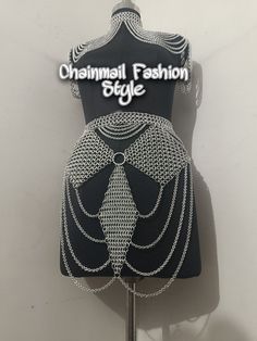 Chainmail Skirt, Chainmaille Shoulder Jewelry,  Rave outfit, Medieval Cosplay Armor, Larp Costume, Christmas Women/girls Christmas Larp Gift Materials : Aluminium Ring Diameter -9 mm Style : Skirt and shoulder jewelry  Type : Ren faire costume  Size Required 👇 *Shoulder to shoulder size for top*👇 Xs- 13.5 Inches  Small- 14.5 Inches Medium- 15.5 Inches Large- 16.5 Inches XL- 17.5 Inches *Neck Size for collar* XS- 12.5 Inches Small- 13.5 Inches Medium- 14.5 Inches Large- 15.5 Inches XL- 16.5 Inches  *Lower waist size for skirt or where to tie the skirt 👇* 30 Inches 32 Inches 34 Inches 36 Inches 38 Inches 40 Inches  Please let me know if there is any change in the given measurement? If yes then Please add your measurements to the Order Notes: -neck size  -shoulder to shoulder size -lower w Chainmaille Shoulder, Chainmail Skirt, Chainmail Armor, Medieval Cosplay, Ren Faire Costume, Shoulder Jewelry, Cosplay Armor, Larp Costume, Rave Outfit