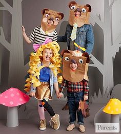 three people in costumes standing next to each other with mushrooms on the ground and trees behind them