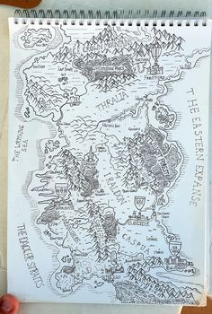 a hand drawn map is shown on a piece of paper