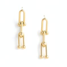 The high polish 14K gold plated finish on our effortlessly cool U Link Chain Earrings will add just the right amount of drama to your outfit throughout the day. Available for Limited Time Only Each purchase supports rehabilitation of women affected by human trafficking. Materials: 14k gold plated stainless steel with 14K gold plated earrings. Hypoallergenic; lead and cadmium free with nickel content less than 100 ppm.Size: 1.6 inches Chic Gold Earrings For Workwear, Chic Gold Earrings For Work, Elegant Gold Earrings For Workwear, Elegant Gold Earrings For Work, Gold-tone Drop Earrings With Adjustable Chain, Trendy Gold Earrings For Work, Gold Metal Jewelry For Workwear, Gold-tone Drop Earrings With Gold Chain, Everyday Gold Linear Pierced Earrings