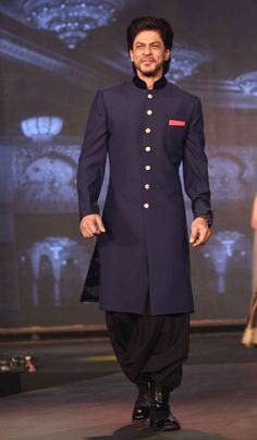 Shah Rukh Khan was charming as always and looked royal in a shervani at the trailer launch of 'Happy New Year'. #Bollywood #Fashion #Style #Handsome Fitted Traditional Wear With Naqshi For Navratri, Ceremonial Nehru Jacket With Traditional Drape, Bandhgala For Traditional Ceremonies Navratri, Formal Long Sleeve Kurta For Navratri, Formal Fitted Kurta For Navratri, Fitted Kurta For Formal Navratri Celebrations, Formal Bandhgala For Navratri With Long Sleeves, Formal Long Sleeve Bandhgala For Navratri, Formal Sherwani For Navratri With Straight Kurta