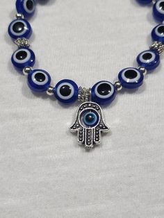 🐣. Offer Xtras! Evil eye stretch bracelet for $12.0 #stretch #blue #protection #bracelet #EvilEye #BadLuck #luck #juju #eye Adjustable Evil Eye Bracelets For Meditation, Adjustable Spiritual Evil Eye Bracelet For Meditation, Spiritual Evil Eye Bracelet With 8mm Beads, Handmade Spiritual Evil Eye Bracelet For Meditation, Adjustable Spiritual Evil Eye Bracelet With Round Beads, Spiritual Round Beaded Bracelets With Evil Eye, Spiritual Evil Eye Beaded Bracelets, Spiritual Evil Eye Bracelets For Healing, Spiritual Round Evil Eye Bracelet