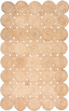 an area rug made out of jute with circles on the bottom and one circle in the middle