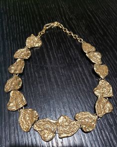 Magnificent and rare vintage Yves Saint Laurent choker necklace in gold metal Heart shape like big nuggets. good condition see photos No returns or exchanges on vintage products You buy what you see. Ysl Heart Necklace, Ysl Vintage, Vintage Yves Saint Laurent, Metal Heart, Choker Necklaces, Bib Necklace, No Se, Yves Saint Laurent, Gold Metal