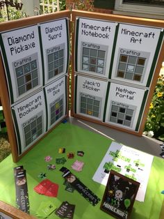 the table is covered with different types of cards and magnets for kids to use