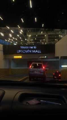 there is a sign that says welcome to up town mall