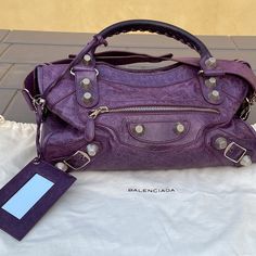 Balenciaga Authentic City Bag Made In Italy Purple Leather Chrome Hardware Mirror Zippered Closure Zippered Pockets Dust Bag Measurements 15” By 10” By 6” Deep Approximate Measurements Double Handles Long Shoulder Strap Clean Minimal Use Hard To Find All Photos Are Part Of The Description Luxury Purple Satchel With Top Carry Handle, Designer Purple Shoulder Bag With Detachable Handle, Designer Purple Shoulder Bag With Removable Pouch, Designer Purple Crossbody Shoulder Bag, Designer Purple Double Handle Shoulder Bag, Designer Purple Travel Bag, Designer Purple Crossbody Bag, Luxury Purple Satchel For Shopping, Designer Purple Tote Bag