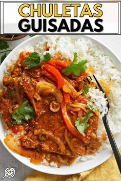 a white plate topped with meat and rice