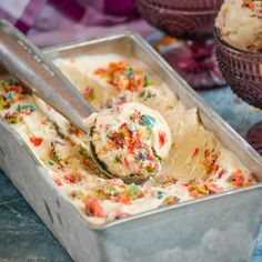 ice cream with sprinkles in a metal container