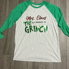 a white and green shirt that says mrs class, but married to the grin on it