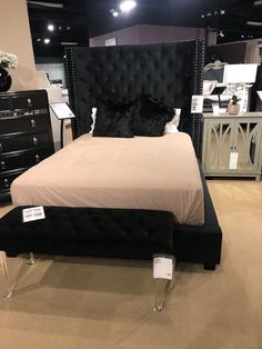 a bed that is on display in a room