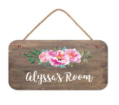 a wooden sign with flowers on it that says,'alyssa's room '