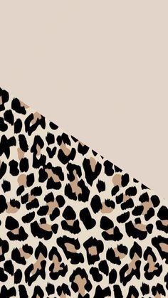 an animal print background with black and white spots