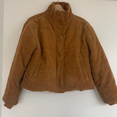 Rvca Brown Corduroy Puffer Jacket Size Small Cosy And Cute Winter Jacket; Great Condition. Barely Worn Zip And Popper Closure For Extra Warmth Body: 100% Cotton Lining: 100% Polyester Filling: 100% Polyester Shoulder To Shoulder: 20in (See Photos) Relaxed Fit Corduroy Outerwear For Winter, Winter Corduroy Outerwear, Everyday Winter Corduroy Outerwear, Everyday Corduroy Winter Outerwear, Winter Corduroy Outerwear For Everyday Wear, Brown Corduroy Outerwear For Cold Weather, Corduroy Puffer Jacket, Corduroy Puffer, Brown Corduroy