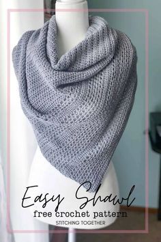 the easy shawl is knitted in grey yarn and sits on a mannequin