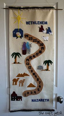 a door hanger decorated with the names and pictures of different animals, trees, and people