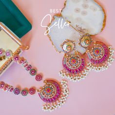 Bollywood Style Pearl Kundan Necklace, Elegant Pearl Necklace With Latkans For Diwali, Elegant Pearl Necklace With Latkans For Festive Occasions, Elegant Sets With Peacock Design For Diwali, Elegant Pink Peacock Design Jewelry, Bollywood Style Chandbali Pearl Necklace For Festive Occasions, Bollywood Style Chandbali Pearl Necklace For Festive Season, Bollywood Chandbali Pearl Necklace For Festive Occasions, Elegant Pink Jewelry With Peacock Design