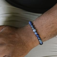 Return to the essentials. Essential for any contemporary men's jewelry assortment, these elastic stone bead bracelets are versatile enough to be worn individually or layered as preferred. - STONE: Sodalite (clear the mind and bring out deep thought)- STONE SHAPE: Round- METAL COLOR: Brushed silver- METAL MATERIAL: 316L stainless steel- BRACELET TYPE: Elastic Stone Bead Bracelets, Deep Thought, Bead Bracelets, Black Edition, Blue Bracelet, Men's Jewelry, Gemstone Bracelet, Bead Bracelet, The Mind