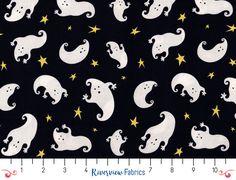 a black background with white and yellow ghost silhouettes, stars and crescents on it