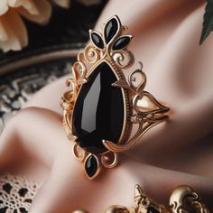 Black Onyx Silver Ring, 925 Sterling Silver Black Onyx Filigree Oval Elongated Statement Ring,Natural Gemstone Gift Boxed for Her, ►Gemstone: Natural Onyx ►Base Metal: 18k Gold Vermeil Plated ►Gross Weight - 4 gm ★Gemstone size: ★ Stone - 8X12 mm ★ Stone Weight- approx. 4.25 carat ► Band measure- ★Band measurements: approx. 1.8mm wide, approx. 1.5mm thick ♥ Packaging: All jewelry comes in a beautiful and careful packaging 🛍 If the item is going directly to the gift recipient please leave us a note during checkout so we don't include the invoice. ★Free Shipping to all countries orders. ★Any problems or questions don't hesitate to get in touch, we will get back to you asap. ★On customers demand we provide certificate also. Our Certificate is Chargeable so please ask if you want. ★ Jewelry c Black Cabochon Jewelry For Wedding, Black Cabochon Wedding Jewelry, Elegant Onyx Ring Jewelry, Elegant Cabochon Teardrop Ring, Elegant Teardrop Cabochon Ring, Onyx Silver Ring, Jewelry Cleaner, Base Metal, Statement Ring