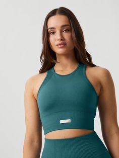 Studio Seamless Bralette - Mallard Blue | Björn Borg Ribbed Racerback Athleisure Crop Top, Training Crop Top With Seamless Construction, Seamless Stretch Crop Top For Gym, Seamless Training Crop Top, Solid Training Crop Top With Seamless Construction, Solid Seamless Training Crop Top, Solid Seamless Crop Top For Training, Athleisure Medium Support Seamless Crop Top, Athleisure Seamless Medium Support Crop Top