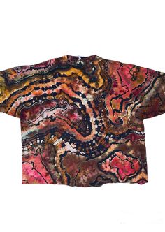 Add a splash of color to your wardrobe with this **Handmade Geode Reverse Style Tie-Dye Shirt**. Each shirt is individually handcrafted, making every piece one-of-a-kind. Perfect for festivals, casual outings, or lounging at home, this tie-dye shirt is a versatile addition to any closet. Enjoy the comfort of 100% cotton and the vibrant, long-lasting colors that won't fade. **Features - **Unique Design No two shirts are alike, giving you a truly unique piece. - **Unisex Fit Designed to fit all body types comfortably. - **Premium Quality Made from soft, breathable 100% cotton. - **Eco-Friendly Dyes Created with environmentally safe, non-toxic dyes. - **Handcrafted with Care Each shirt is lovingly crafted by hand. **Why Choose Our Tie-Dye Shirt - **Versatile Style Perfect for festivals, beach Multicolor Bohemian Relaxed Fit T-shirt, Multicolor Short Sleeve Tops With Batik Print, Multicolor Batik Print Short Sleeve Top, Relaxed Fit Short Sleeve Top With Batik Print, Relaxed Fit Short Sleeve Batik Print Top, Relaxed Fit Short Sleeve Batik Top, Relaxed Fit Batik Print Top With Short Sleeves, Bohemian Multicolor Relaxed Fit T-shirt, Bohemian Style Multicolor Relaxed Fit T-shirt