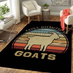 a rug that says rhinos on it in front of a couch and chair with two chairs