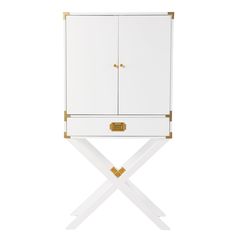 a white and gold cabinet with two doors on one side, an x frame on the other