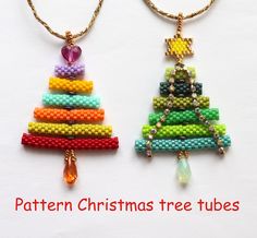 two christmas tree necklaces made out of beads