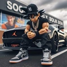 a man sitting on the hood of a car in front of a store with his arms crossed