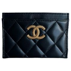 Chanel Black Leather Quilted CC Card Holder Made In: Spain Color: Black Hardware: Goldtone Materials: Lambskin leather Lining: Leather and grosgrain Four credit card slots Exterior Condition: Like new Interior Condition: Like new Includes: Box and pouch Measurements: 4.5" W x 3" H Button Closure Flap Card Holder Chanel With Pocket In Back, Cc Card, Chanel Wallet, Card Holder Wallet, Chanel Black, Black Hardware, Small Accessories, Clothing Ideas, Lambskin Leather