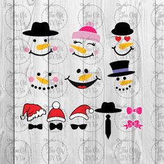 snowmen with hats and sunglasses on wooden planks