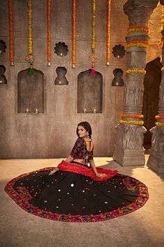 Shubhkala Black Designer Mirror Work with Embroidered Chaniya choli for Navratri Festival Celebrate the Navratri festival in style with the Shubhkala Black Designer Mirror Work with Embroidered Chaniya Choli. This stunning outfit features intricate mirror work and embroidery, adding a touch of elegance and tradition to your festive look. Crafted with attention to detail, this chaniya choli is perfect for those who want to stand out during the celebrations. Key Features Elegant black chaniya choli set designed for Navratri celebrations. Intricate mirror work and embroidery for a traditional look. High-quality fabric for comfort and durability. Available in various sizes to fit different body types. Specifications Color: Black Pattern: Mirror Work and Embroidery Occasion: Navratri Festival F Bohemian Lehenga With Pallu For Navratri, Semi-stitched Lehenga With Resham Embroidery For Festival, Bohemian Semi-stitched Choli For Navratri, Semi-stitched Bohemian Choli For Navratri, Festive Art Silk Choli With Mirror Work, Bollywood Diwali Choli With Embroidery, Bohemian Sharara With Pallu For Navratri, Bohemian Lehenga With Resham Embroidery For Festive, Bohemian Lehenga With Resham Embroidery For Festive Occasions