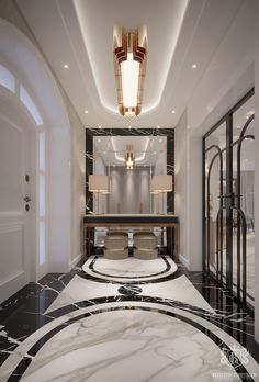 the interior of a luxurious hotel room with marble flooring and chandelier hanging from the ceiling