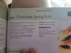 someone is reading a recipe book about chocolate spring rolls