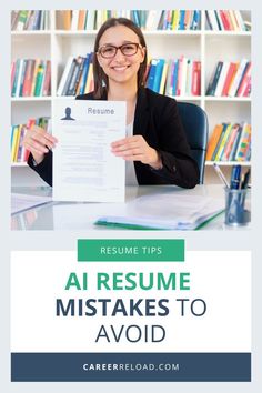 a woman sitting at a desk holding up a resume