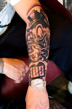 a person with a tattoo on their arm