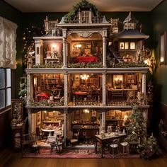 a doll house with lots of furniture and decorations