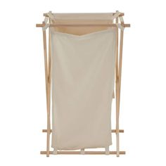 a white laundry hamper with a wooden frame and canvas hanging from the back, on a white background