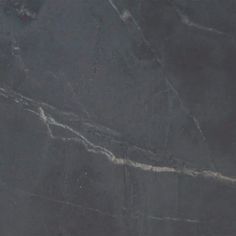 a black marble textured surface with white lines