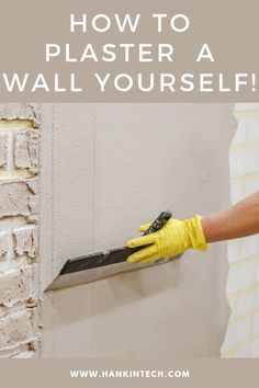 a person in yellow gloves is using a knife to plaster a wall with the words how to plaster a wall yourself