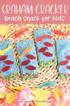 graham cracker beach snack for kids with sprinkles and sea creatures on them